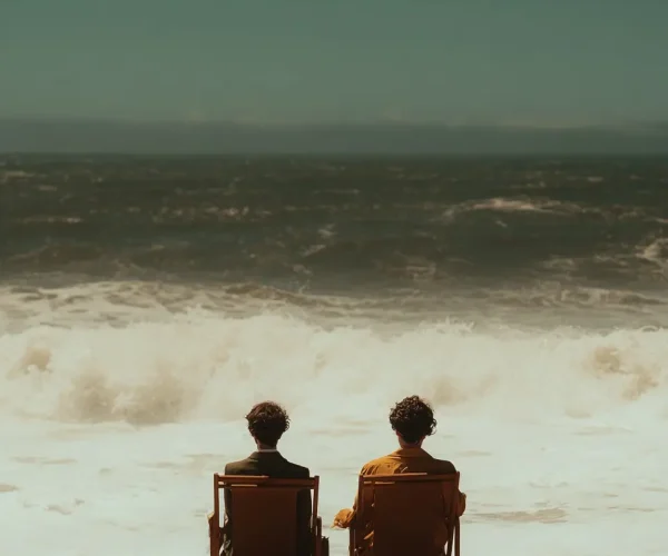 A_cinematic_scene_of_two_people_sit